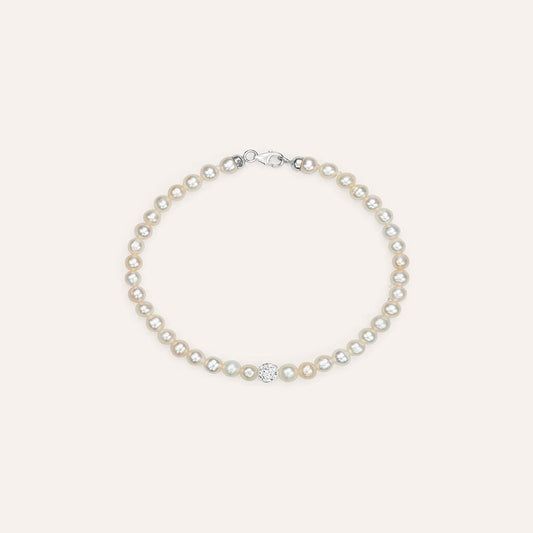 Pulsera Gabrielle de oro blanco con perla de agua dulce y cristal