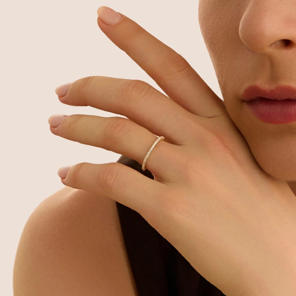 Anillo Riviere Claire de oro amarillo con circonitas