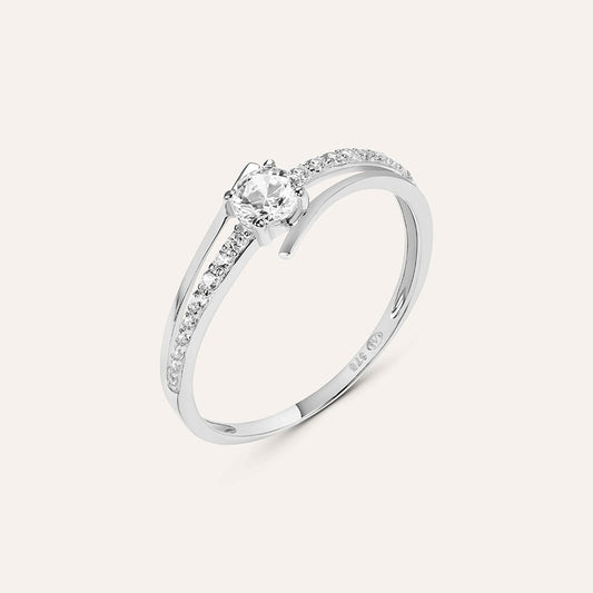 Anillo solitario Claire de oro blanco con circonitas